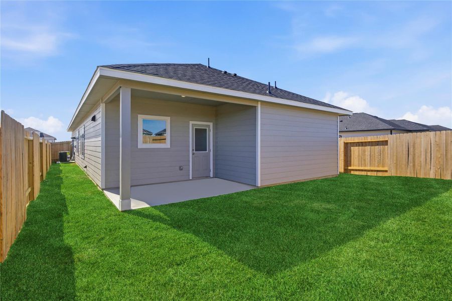 Exterior details and patio area of a home in Sweetgrass Village, Crosby (Image 3). Exterior details and patio area of a home in Sweetgrass Village, Crosby (Image 3).