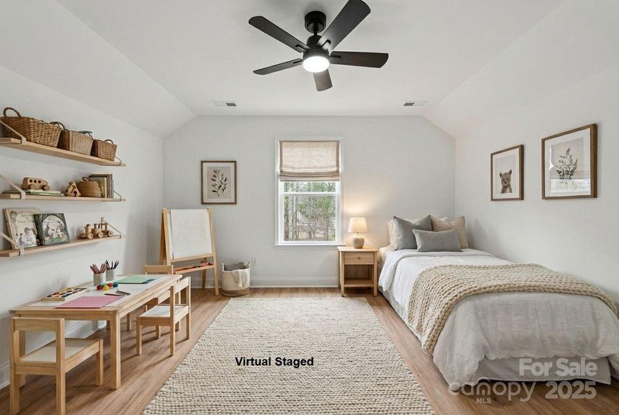 Upstairs bedroom with door to bathroom Upstairs bedroom with door to bathroom