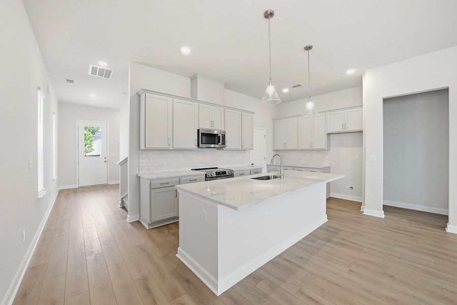 Furnished interior view inside a new home in Blue Heron Retreat, Little River (Image 6).