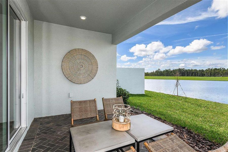Exterior details and patio area of a home in Del Webb Sunbridge, St. Cloud (Image 3).