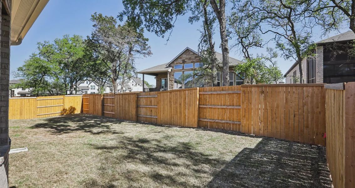 Exterior details and patio area of a home in 6 Creeks, Kyle (Image 3).