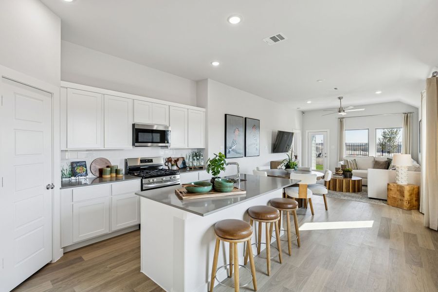 Kitchen in a Nicholson Ranch Magnolia Model Home in Lavon TX by Trophy Signature Homes