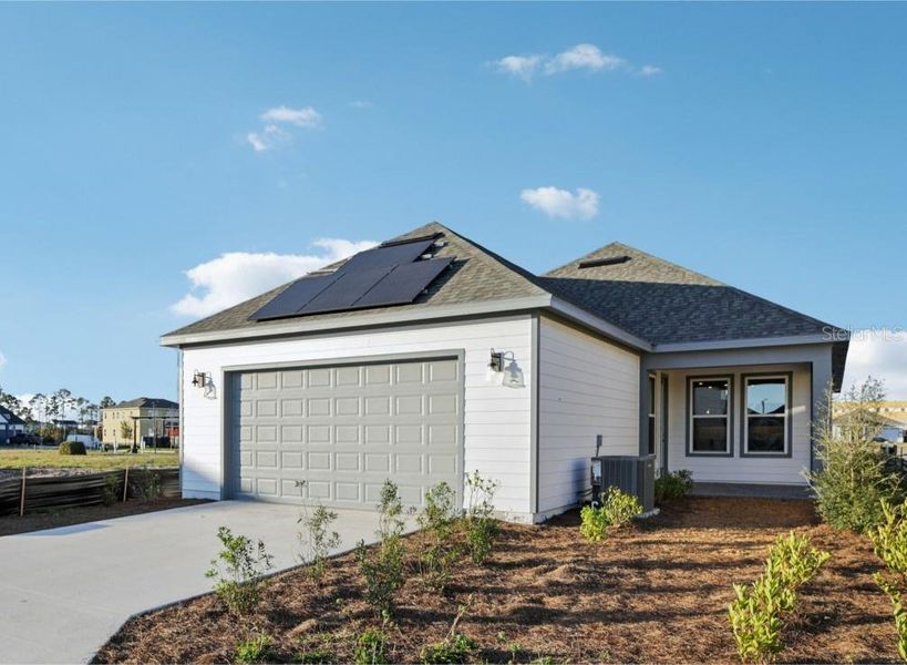 Front exterior of a new home in Weslyn Park Single Family, St. Cloud, FL, highlighting curb appeal (Image 10).