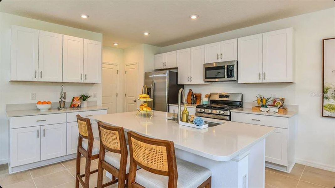 Furnished interior view inside a new home in Coasterra Community Group Page, Palmetto (Image 4).