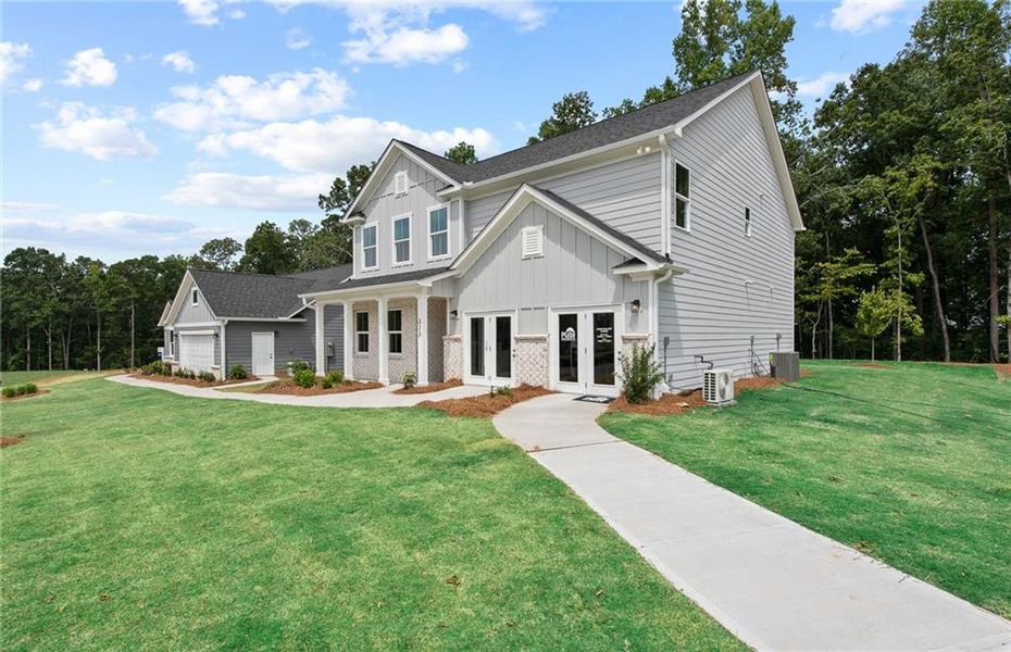 Front exterior of a new home in Watermist at Mirror Lake, Villa Rica, GA, highlighting curb appeal (Image 25).
