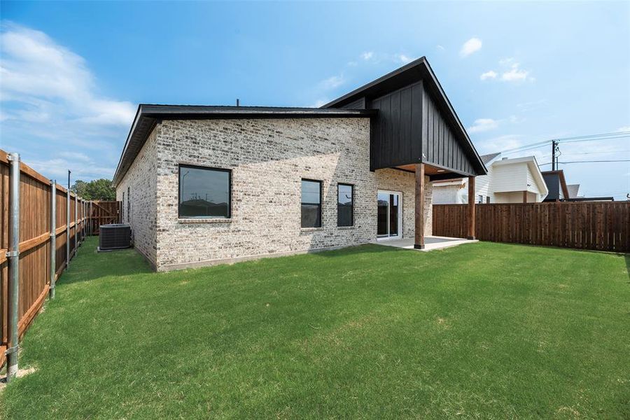 Front exterior of a new home in , Greenville, TX, highlighting curb appeal (Image 15). Front exterior of a new home in , Greenville, TX, highlighting curb appeal (Image 15).