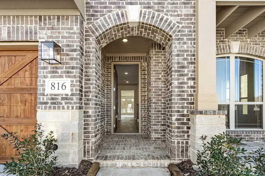 Exterior details and patio area of a home in Homestead at Daniel Farms, DeSoto (Image 3).