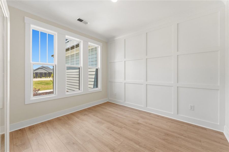 Board and batten detailing elevates this well-lit
