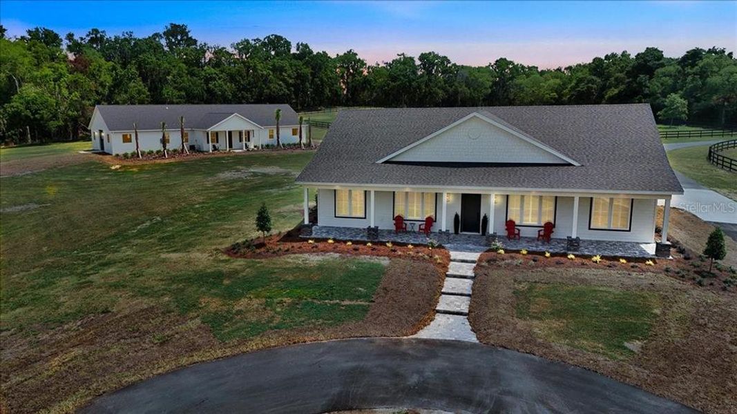 Front exterior of a new home in , Citra, FL, highlighting curb appeal (Image 31).