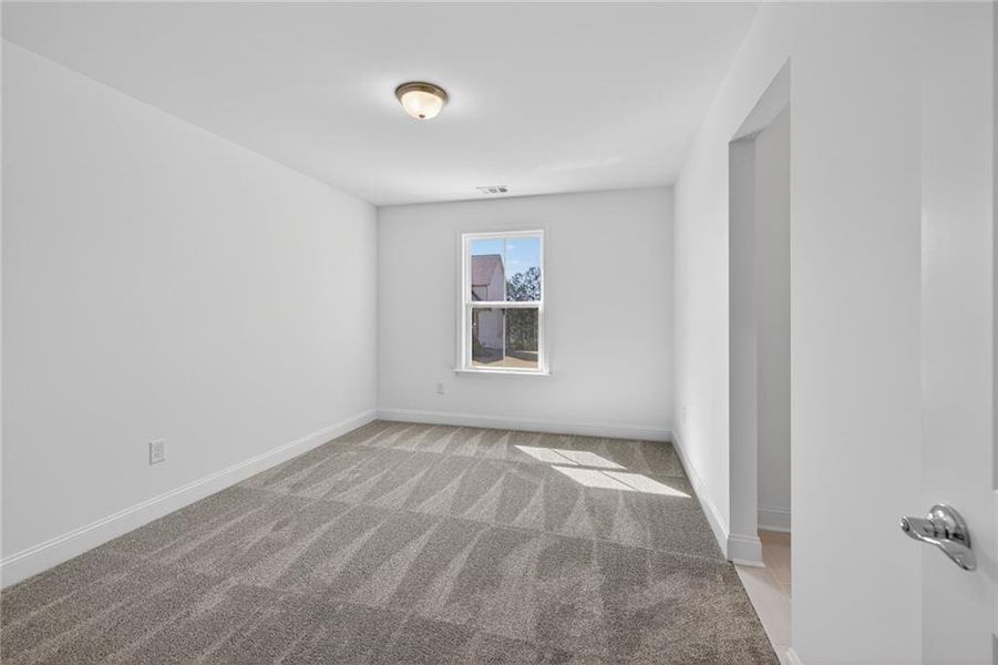 Spacious, unfurnished interior of a new home in Riversprings, Dacula (Image 50).