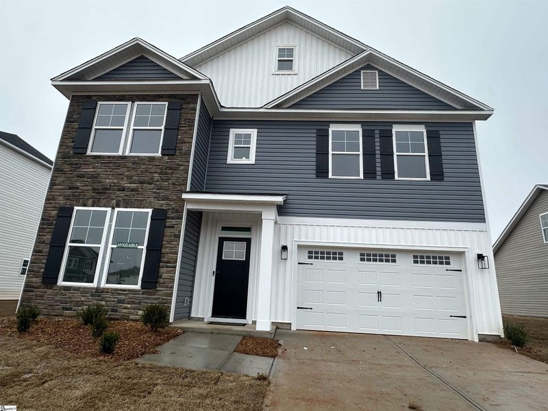 Front exterior of a new home in Shiloh Trail, Wellford, SC, highlighting curb appeal (Image 25).