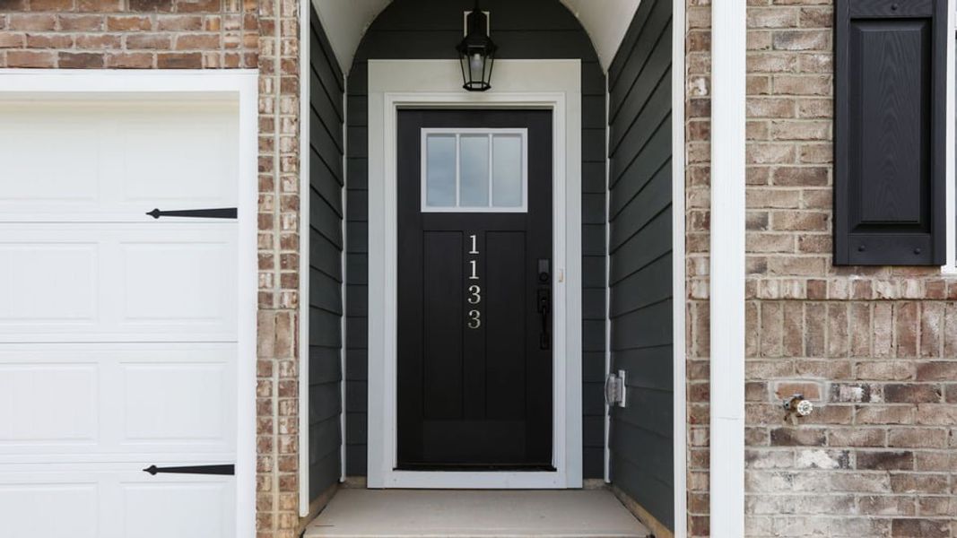 Exterior details and patio area of a home in Sycamore Cove, Woodruff (Image 3).