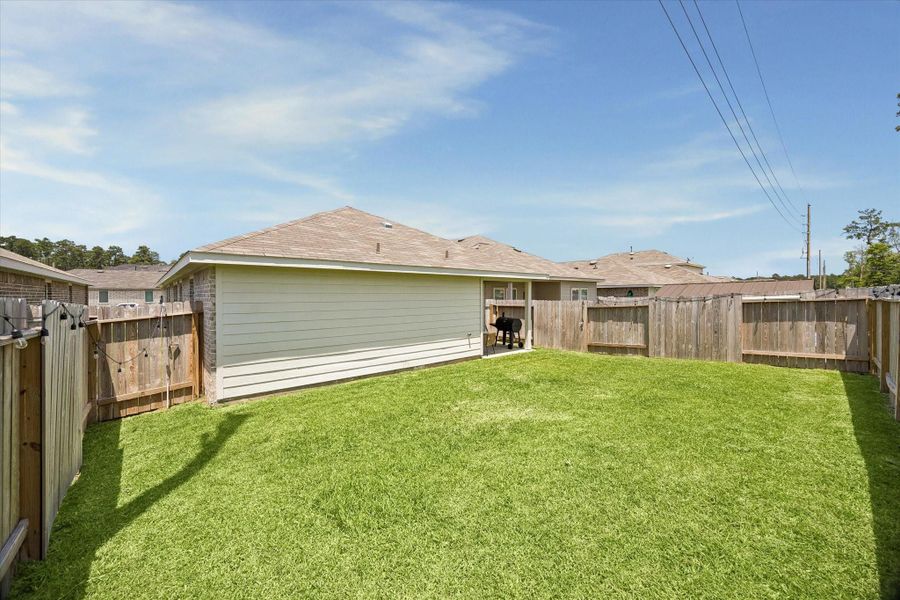 Exterior details and patio area of a home in , Spring (Image 4).