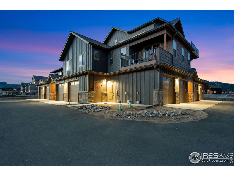 Front exterior of a new home in , Estes Park, CO, highlighting curb appeal (Image 17).