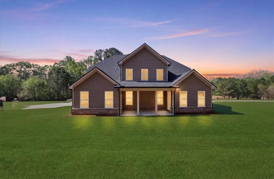 Front exterior of a new home in , Hoschton, GA, highlighting curb appeal (Image 31).