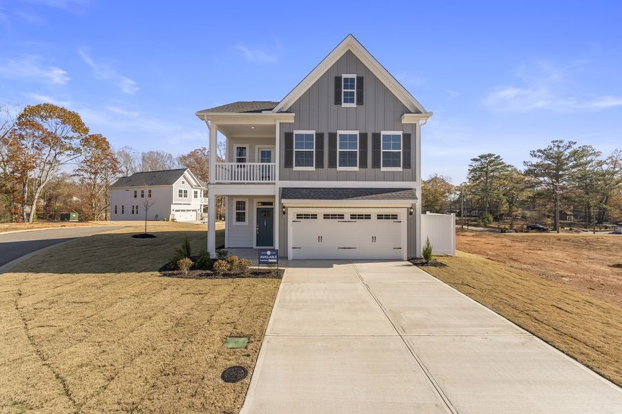 Front exterior of a new home in Lakeside Saluda, Greenville, SC, highlighting curb appeal (Image 1). Front exterior of a new home in Lakeside Saluda, Greenville, SC, highlighting curb appeal (Image 1).