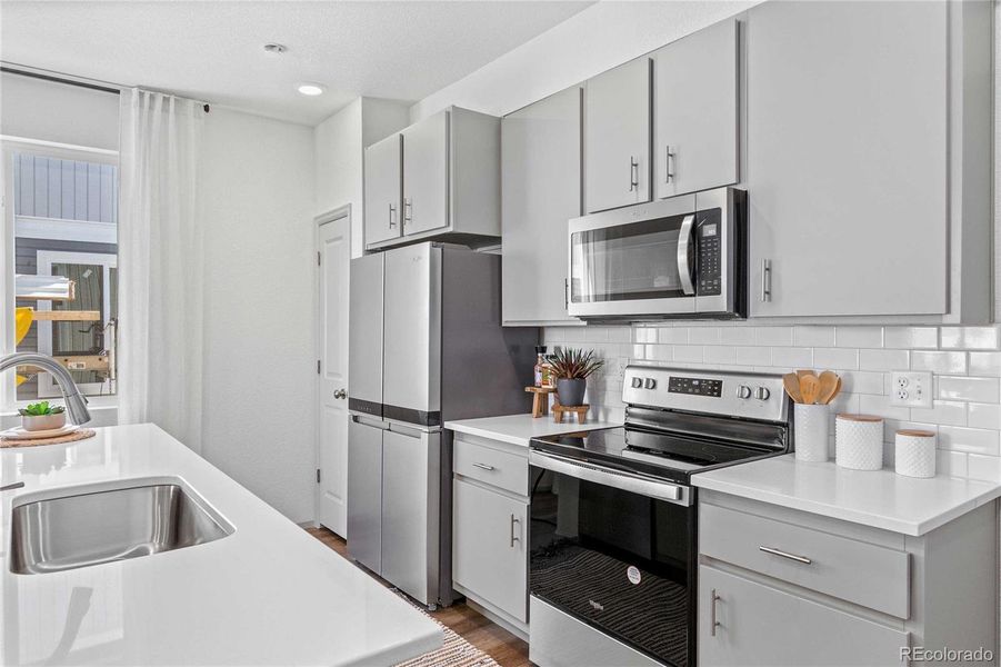 Furnished interior view inside a new home in Green Valley Ranch, Aurora (Image 10).