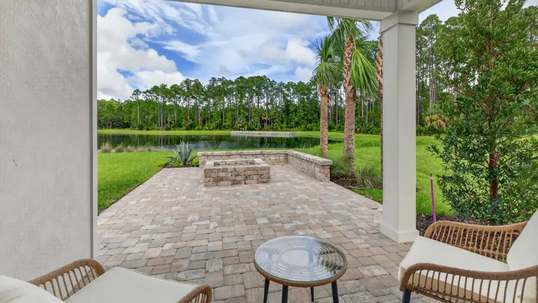 Exterior details and patio area of a home in American Village, Palm Coast (Image 3).