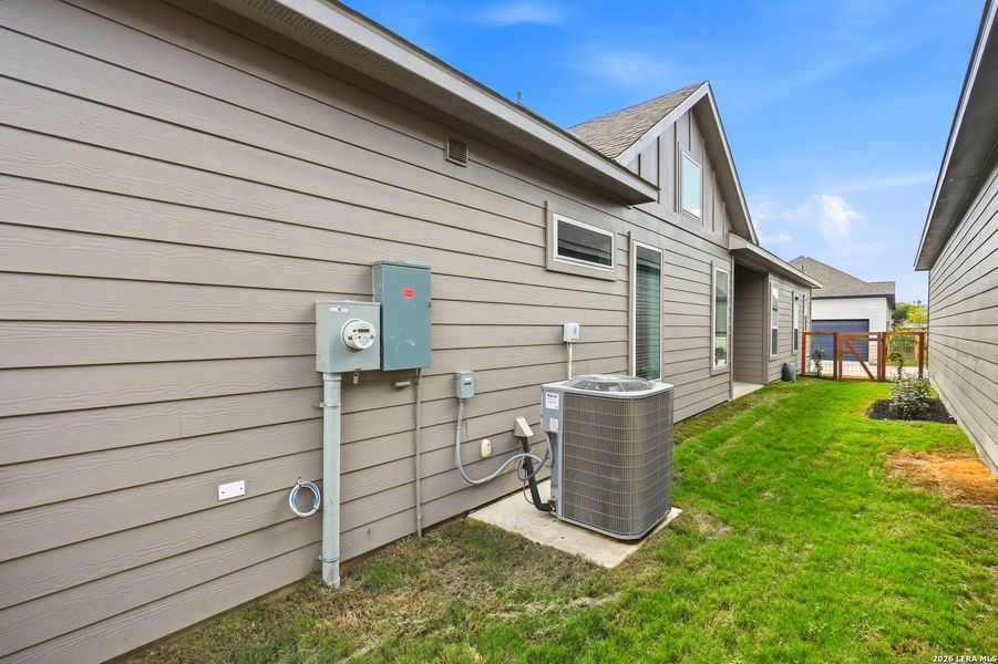 Exterior details and patio area of a home in The Crossvine, Schertz (Image 24).