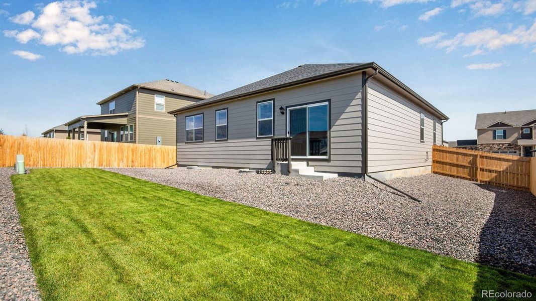 Exterior details and patio area of a home in Timberleaf, Thornton (Image 23).