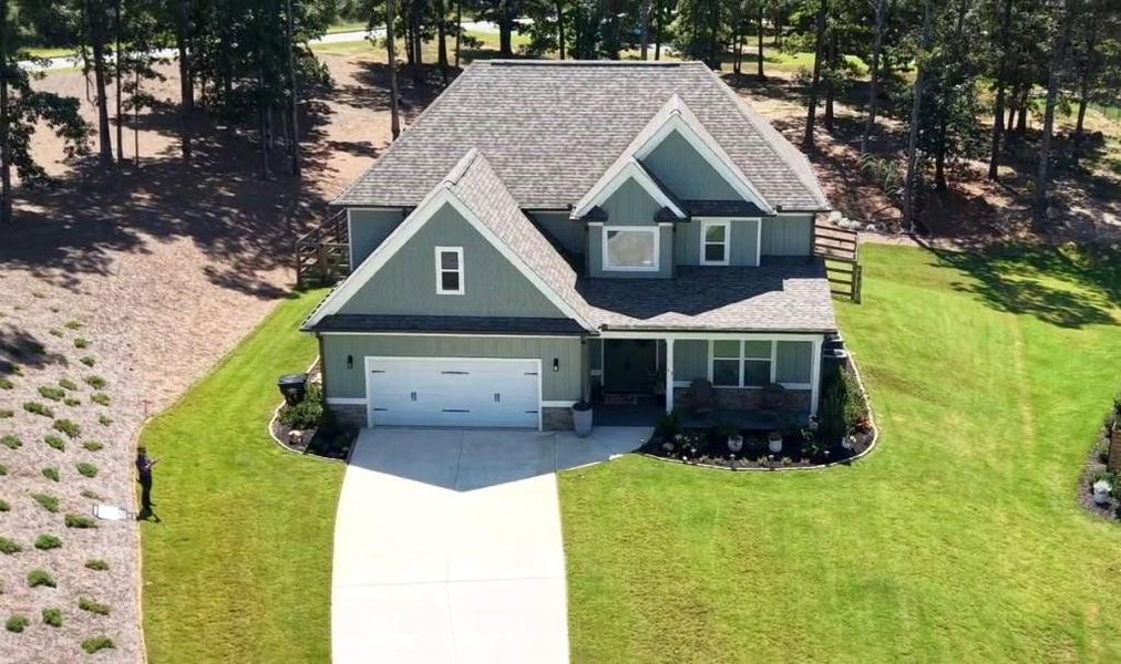 Front exterior of a new home in Griffin Manor, Cartersville, GA, highlighting curb appeal (Image 21). Front exterior of a new home in Griffin Manor, Cartersville, GA, highlighting curb appeal (Image 21).