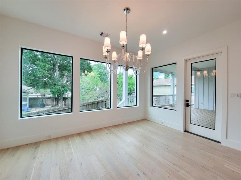 Spacious dining area offers easy access to the covered deck.