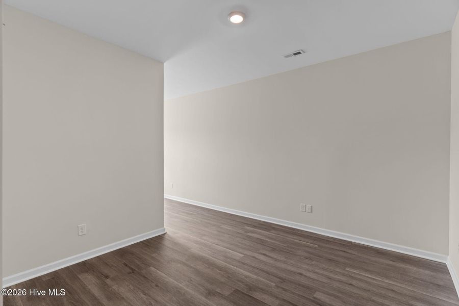Spacious, unfurnished interior of a new home in Coastal Haven Townes, Leland (Image 28).