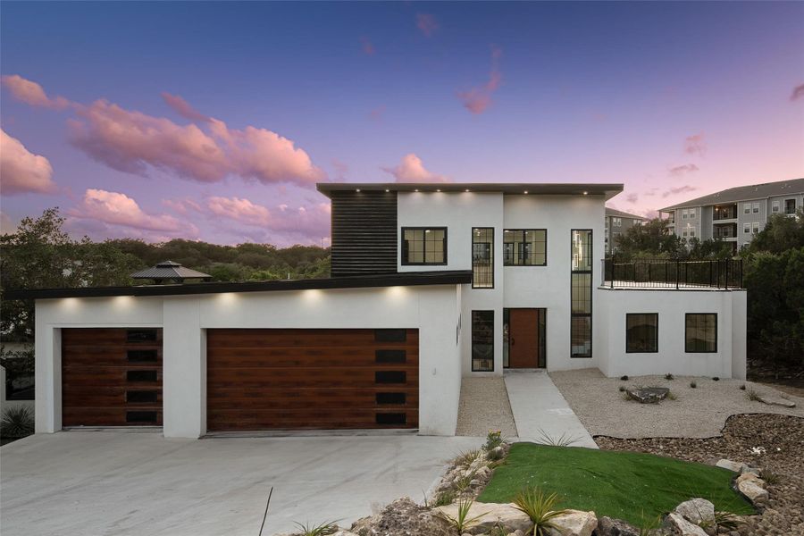 Front exterior of a new home in , Lago Vista, TX, highlighting curb appeal (Image 2).