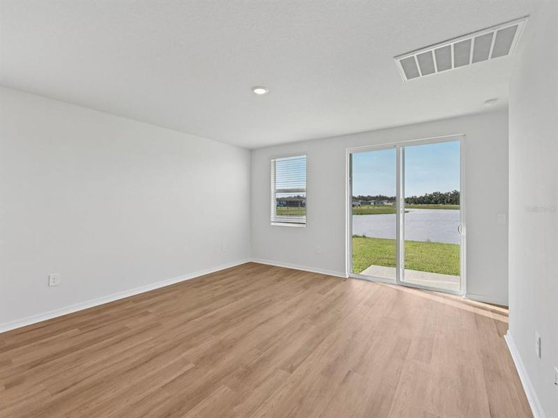 Spacious, unfurnished interior of a new home in Oakfield Trails - Premier Series, Parrish (Image 15).