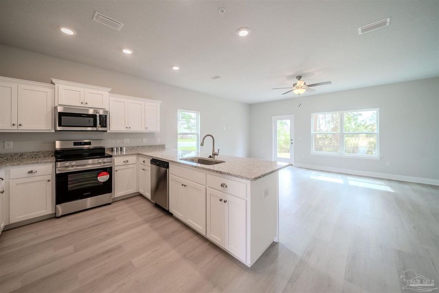 Furnished interior view inside a new home in Lexlee Estates, Pensacola (Image 5).