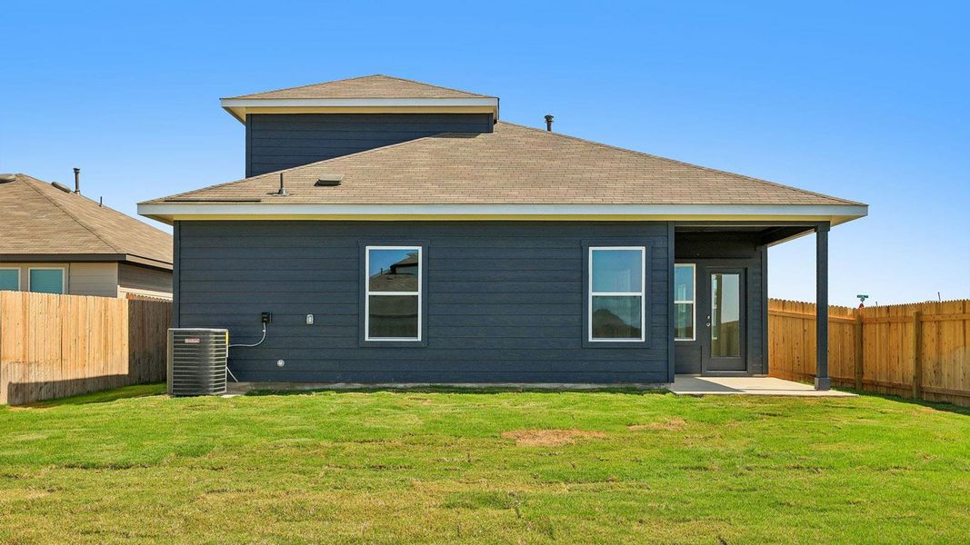 Exterior details and patio area of a home in Carillon, Manor (Image 3).