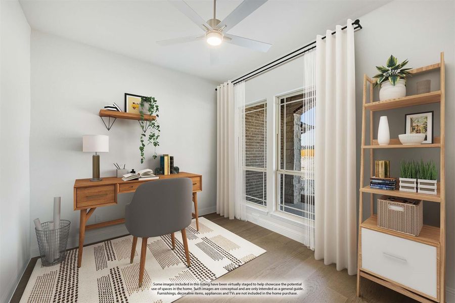 Home office with wood desk, ceiling fan, sliding glass door, and open shelving unit on hardwood floors