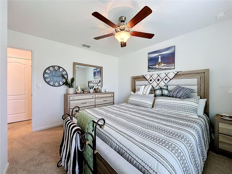 Furnished interior view inside a new home in Sawmill Branch Express, Palm Coast (Image 11).