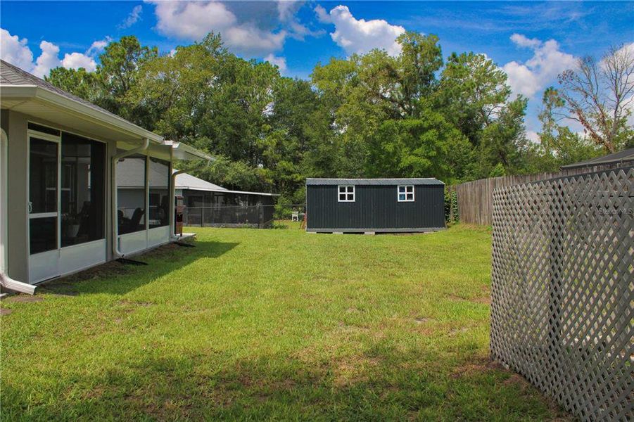 Exterior details and patio area of a home in , Summerfield (Image 25).