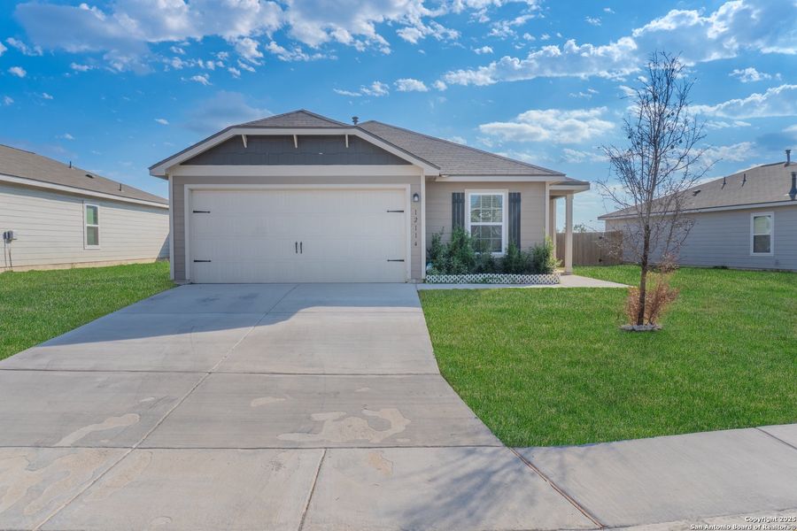 Front exterior of a new home in Luckey Ranch, San Antonio, TX, highlighting curb appeal (Image 2).
