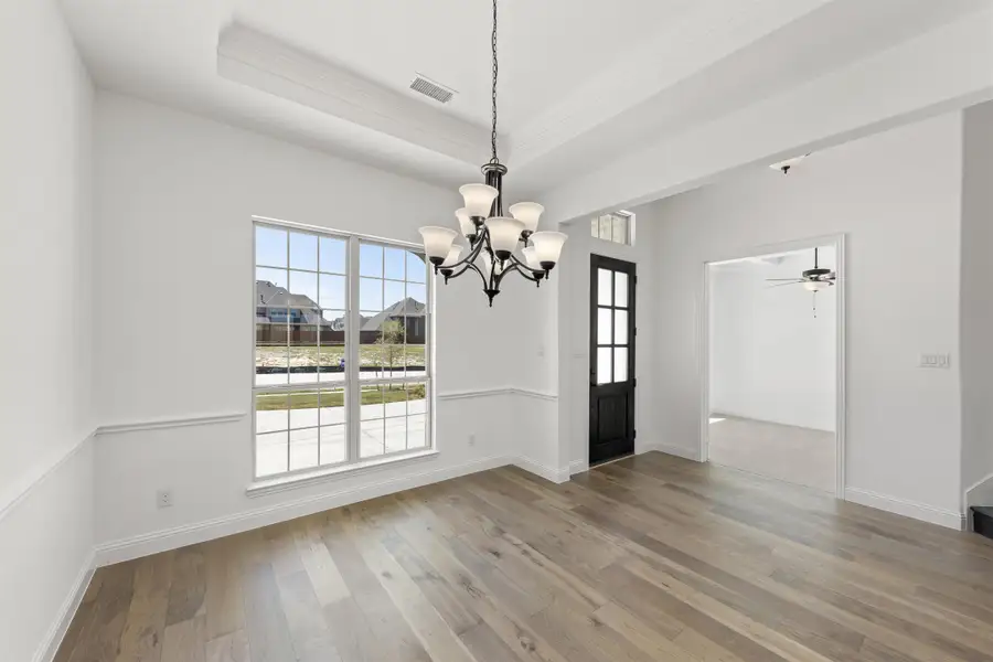 Representative unfurnished interior of a home built from the Newport by Windsor Homes in Nelson Lake Estates, Rockwall (Image 15).
