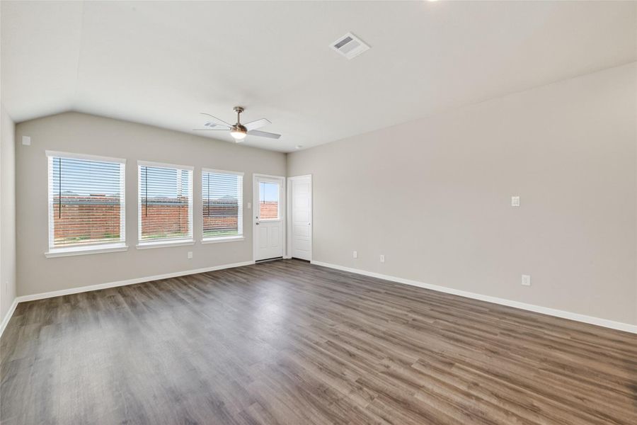 Spacious, unfurnished interior of a new home in Sunterra, Katy (Image 38).