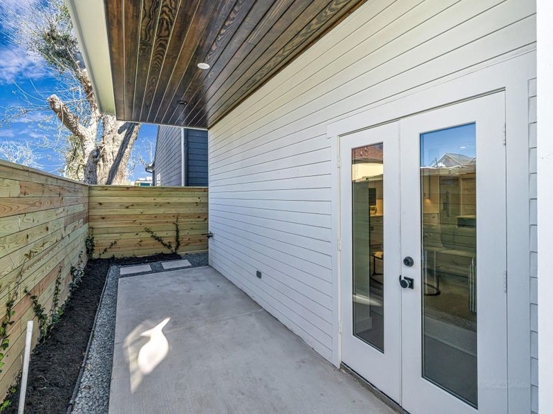 Exterior details and patio area of a home in , Houston (Image 4). Exterior details and patio area of a home in , Houston (Image 4).