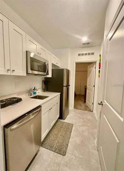 Furnished interior view inside a new home in Lawson Dunes, Haines City (Image 7).