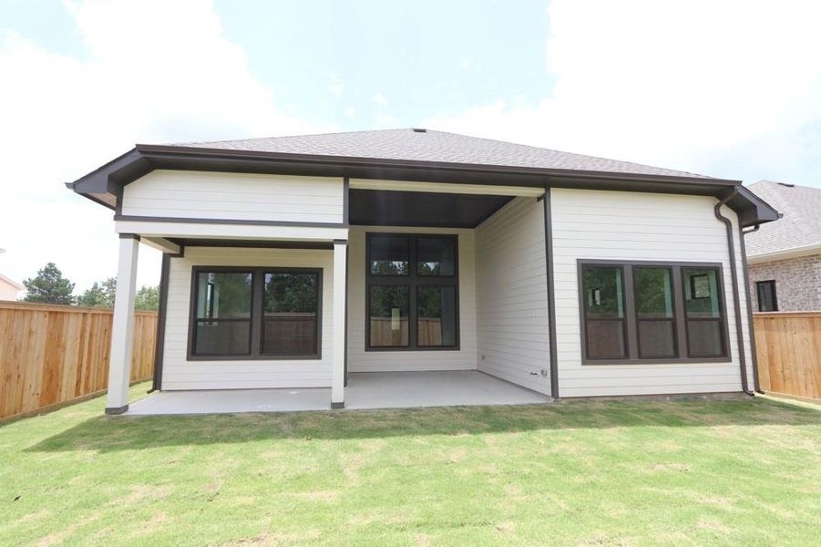 Front exterior of a new home in Kresston, Magnolia, TX, highlighting curb appeal (Image 1). Front exterior of a new home in Kresston, Magnolia, TX, highlighting curb appeal (Image 1).
