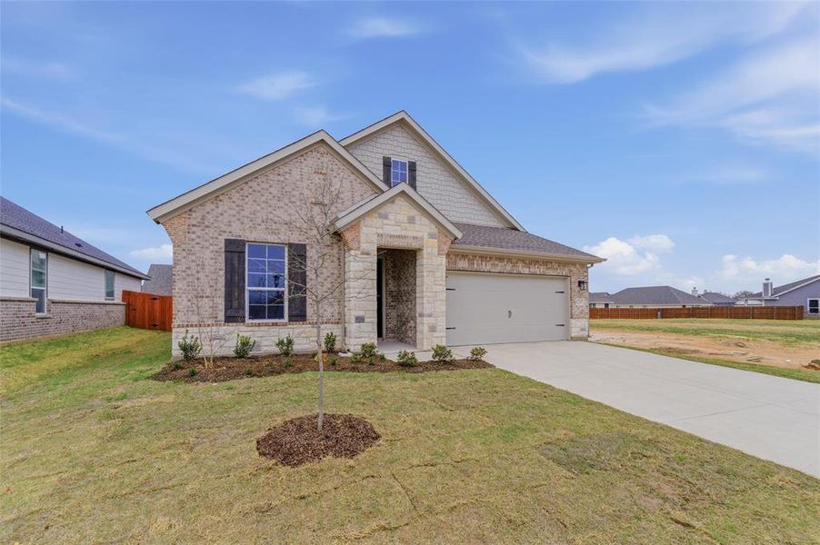 Front exterior of a new home in Covenant Park, Springtown, TX, highlighting curb appeal (Image 17).