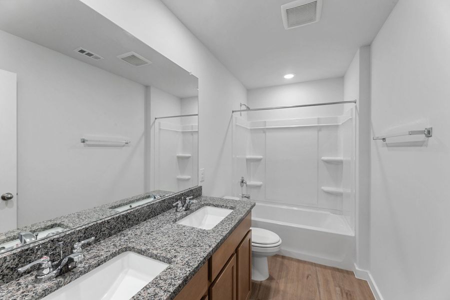 Furnished interior view inside a new home in Highland Ridge, New Braunfels (Image 18).