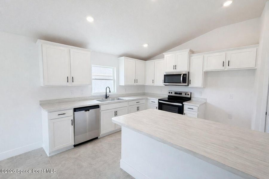 Furnished interior view inside a new home in St. John's Preserve, Palm Bay (Image 5).