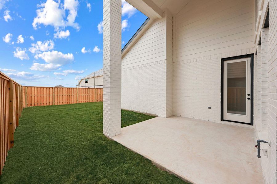 Exterior details and patio area of a home in Parmer Ranch - 40', Georgetown (Image 2). Exterior details and patio area of a home in Parmer Ranch - 40', Georgetown (Image 2).