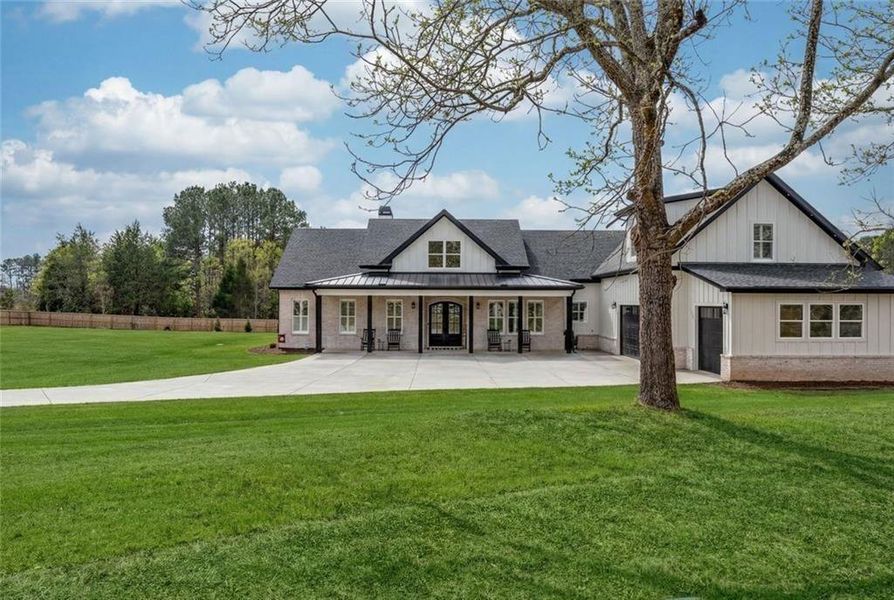 Front exterior of a new home in , Bethlehem, GA, highlighting curb appeal (Image 21).
