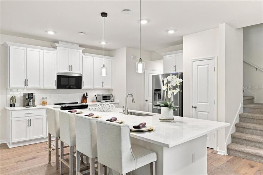 Furnished interior view inside a new home in Towns at Riverwalk, Sanford (Image 5). Furnished interior view inside a new home in Towns at Riverwalk, Sanford (Image 5).