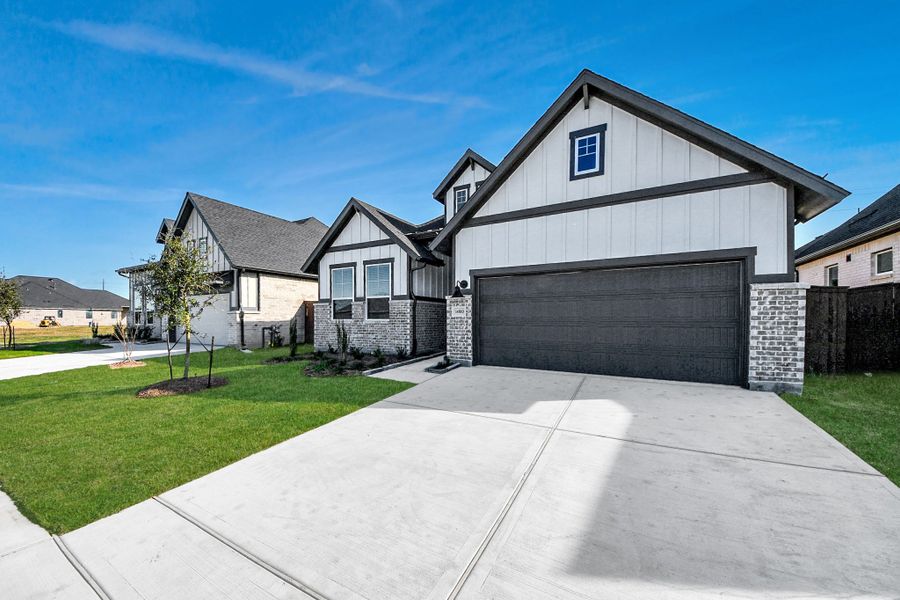 Front exterior of a new home in Beacon Point, Texas City, TX, highlighting curb appeal (Image 28).