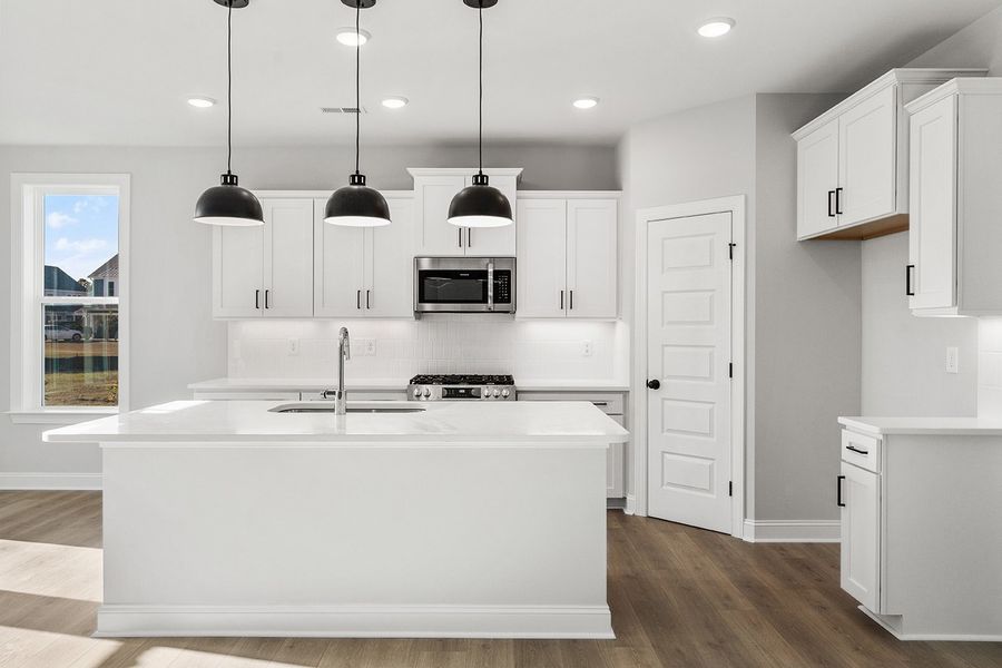 Representative furnished interior of a home built from the The Chandler by RobuckHomes in Windwater, Hampstead (Image 15).