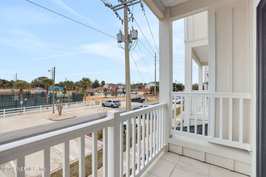 Exterior details and patio area of a home in North Beach Townhomes, Jacksonville Beach (Image 22).