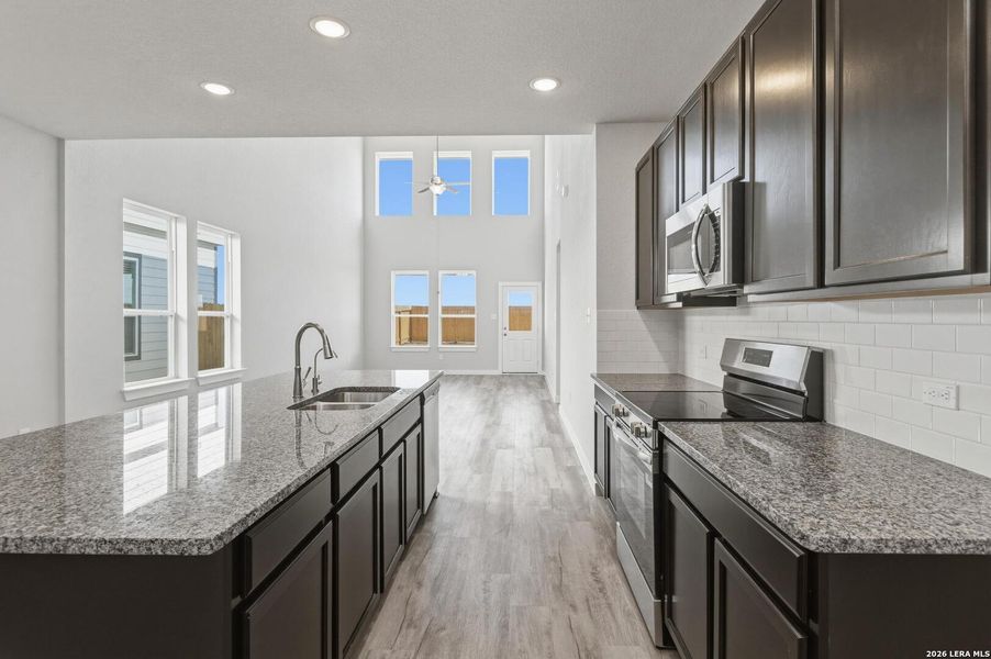 Furnished interior view inside a new home in Red Hawk Landing, San Antonio (Image 7).